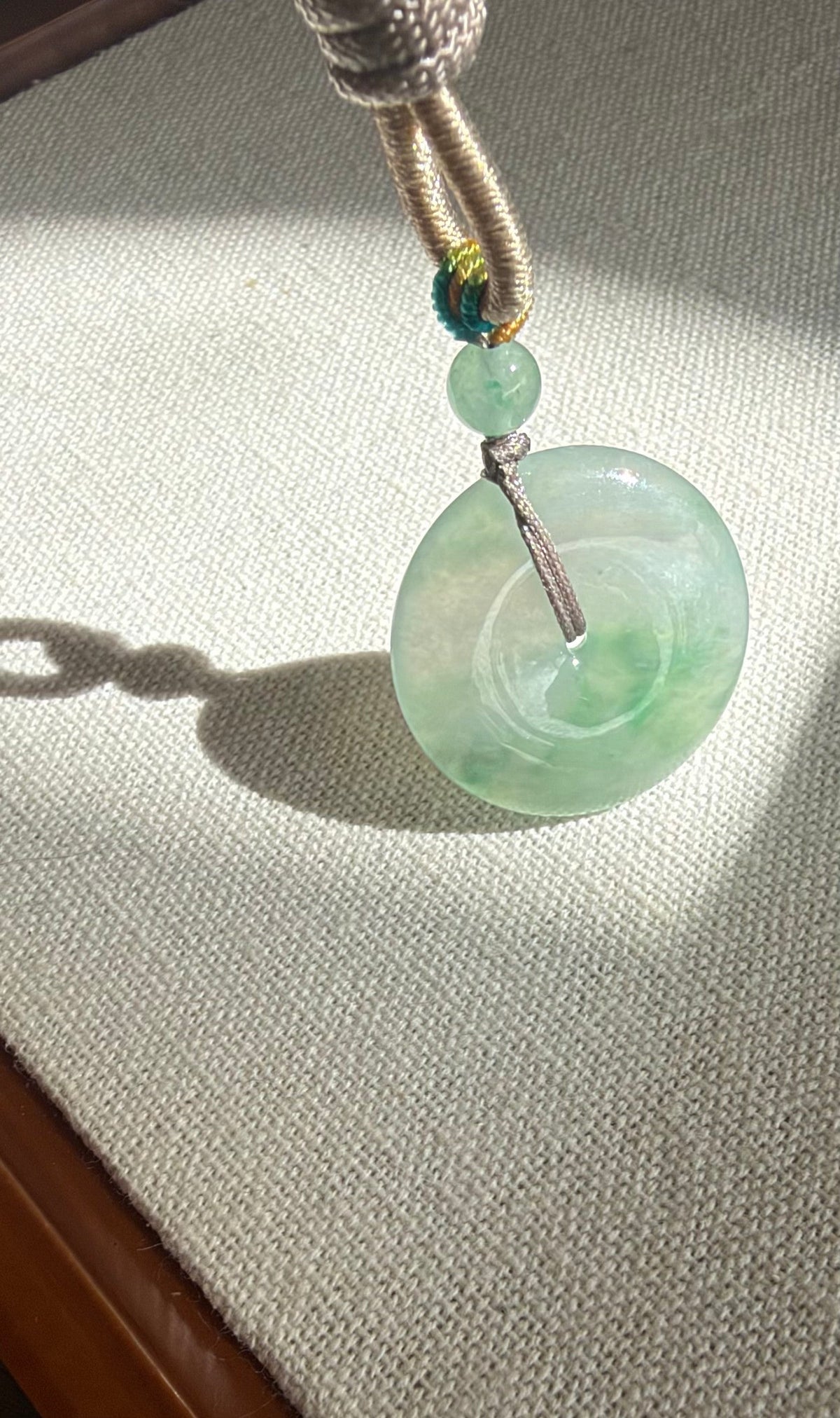 Actual jadeite pendant detail