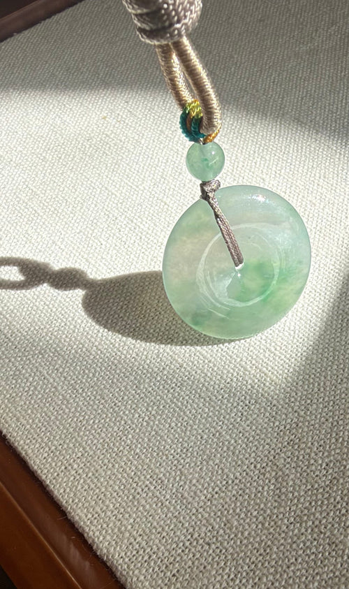 Actual jadeite pendant detail